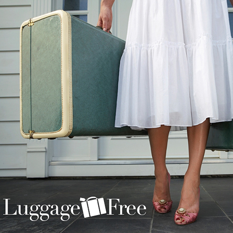 Woman holding a piece of luggage